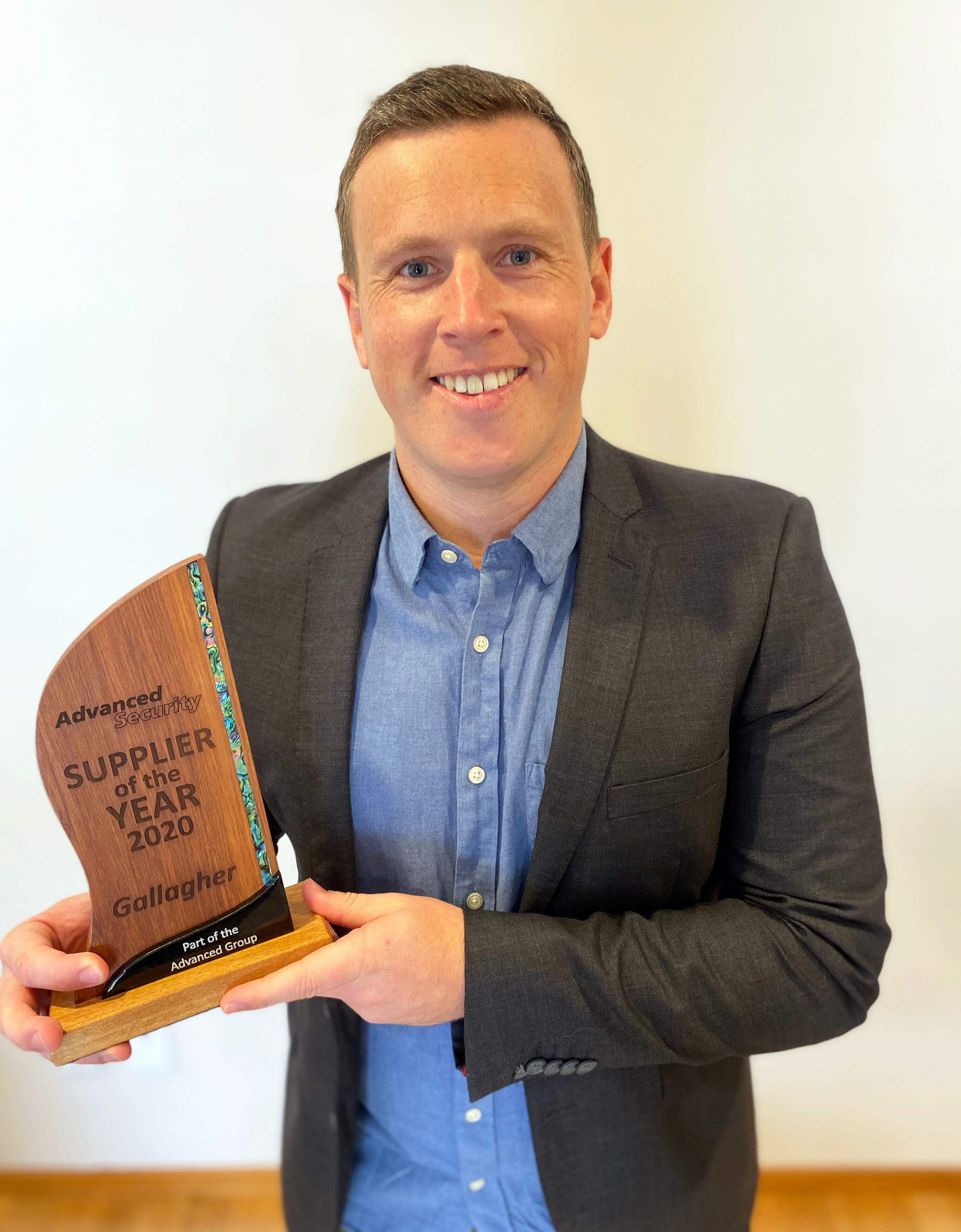 Brad Small with Advanced Security Supplier of the Year award-General Purpose Brad Small with Advanced Security Supplier of the Year award-General Purpose