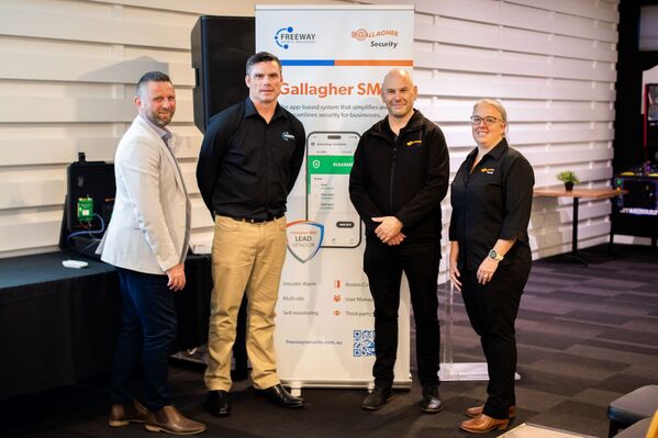 Team members from Gallagher Security and Freeway pose for photo at lead vendor launch event