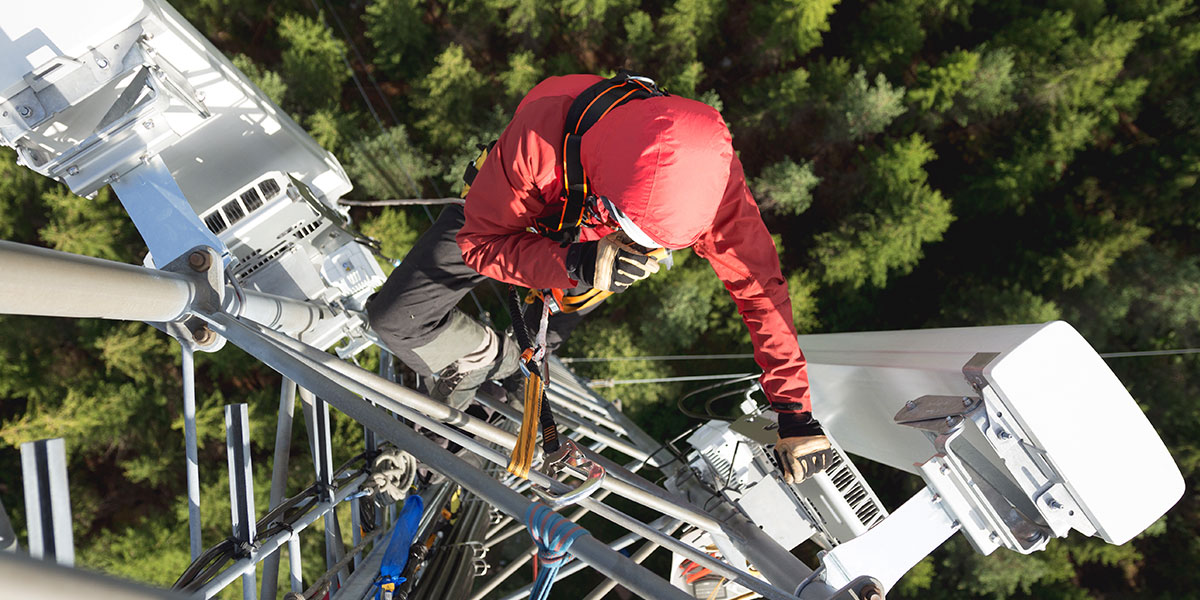 Telecommunication engineer working on 3g tower