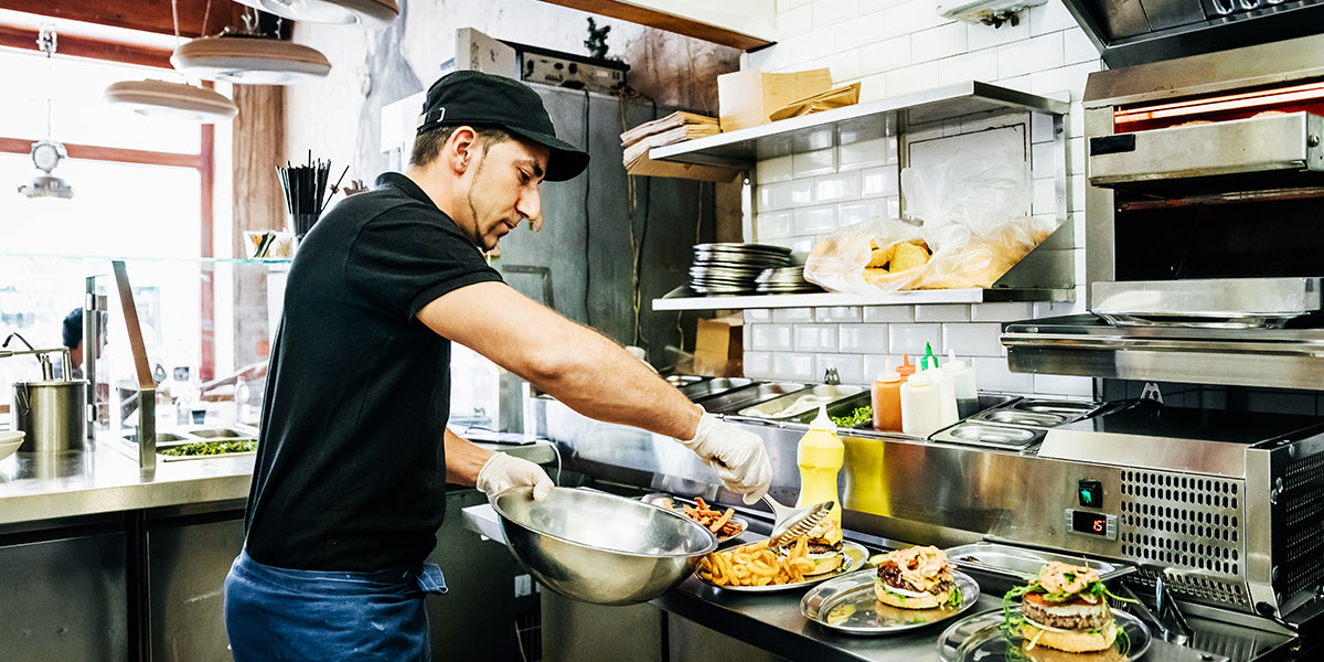 Chef preparing food in restaurant kitchen