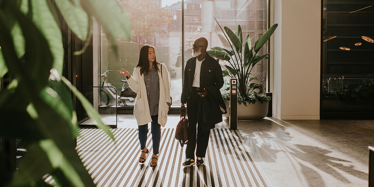 Man and women enter co working office