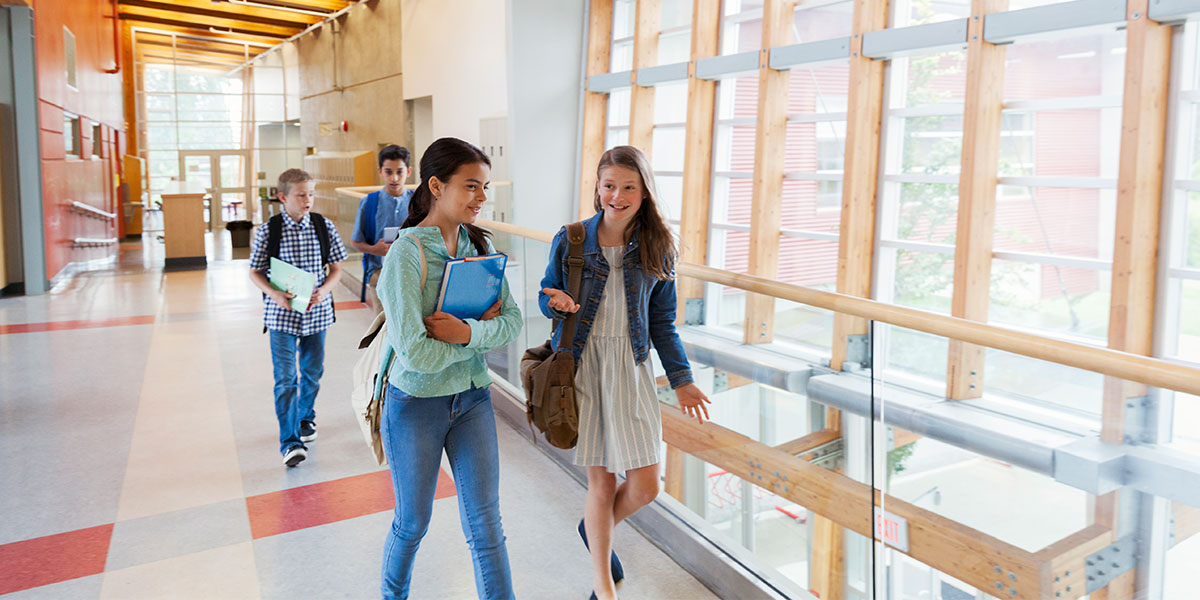 Students walking through school building
