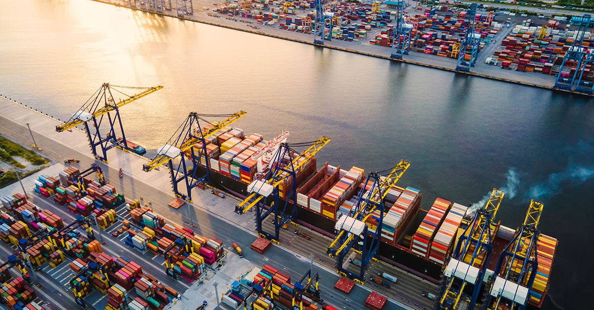 Transport hub at port with containers and container ship