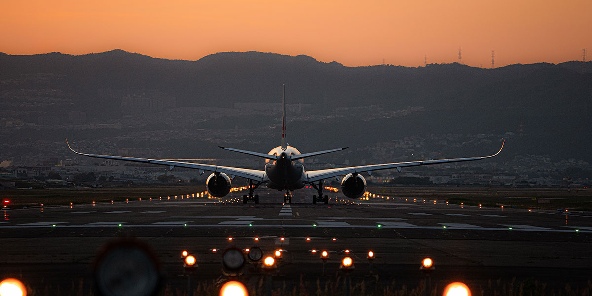 Plane flying into land on runway