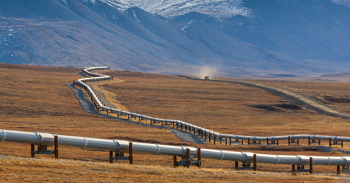 Aerial view of gas pipeline running in the foothills of a mountain
